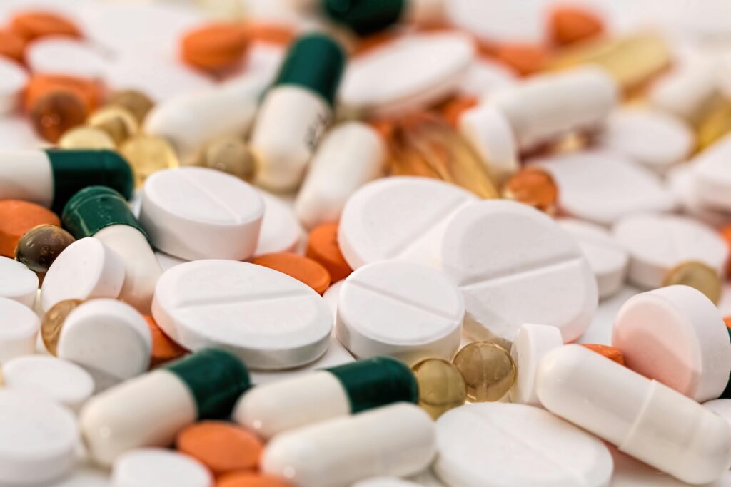 headache-pain-pills-medication-159211-159211 Close-up of various pills and capsules in different colors and sizes, ideal for healthcare-related content.